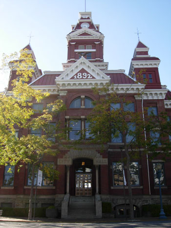 Whatcom Museum, a stately red brick building with three towers, built in 1892.