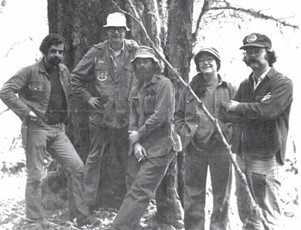 Prog Grabert and archaeology crew in front of a large doug fir trunk