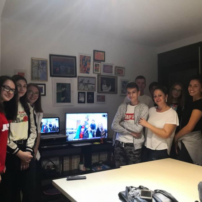 High school students from Brčko pose while video chatting with linguistics students at Western, fall 2019. Photo courtesy of Marija Runic.