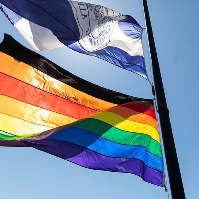 Western Washington University Flag and Rainbow Pride Flag with Black and Brown stripes
