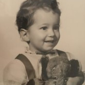 A baby photo of Katey in black and white