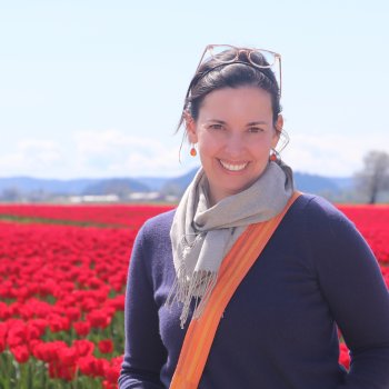 Photo of Dr. Stephanie Grimm amid Mt. Vernon tulip fields