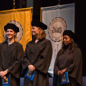 three young women graduates at convocation