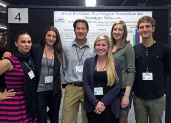 Six students and faculty members presenting their research 