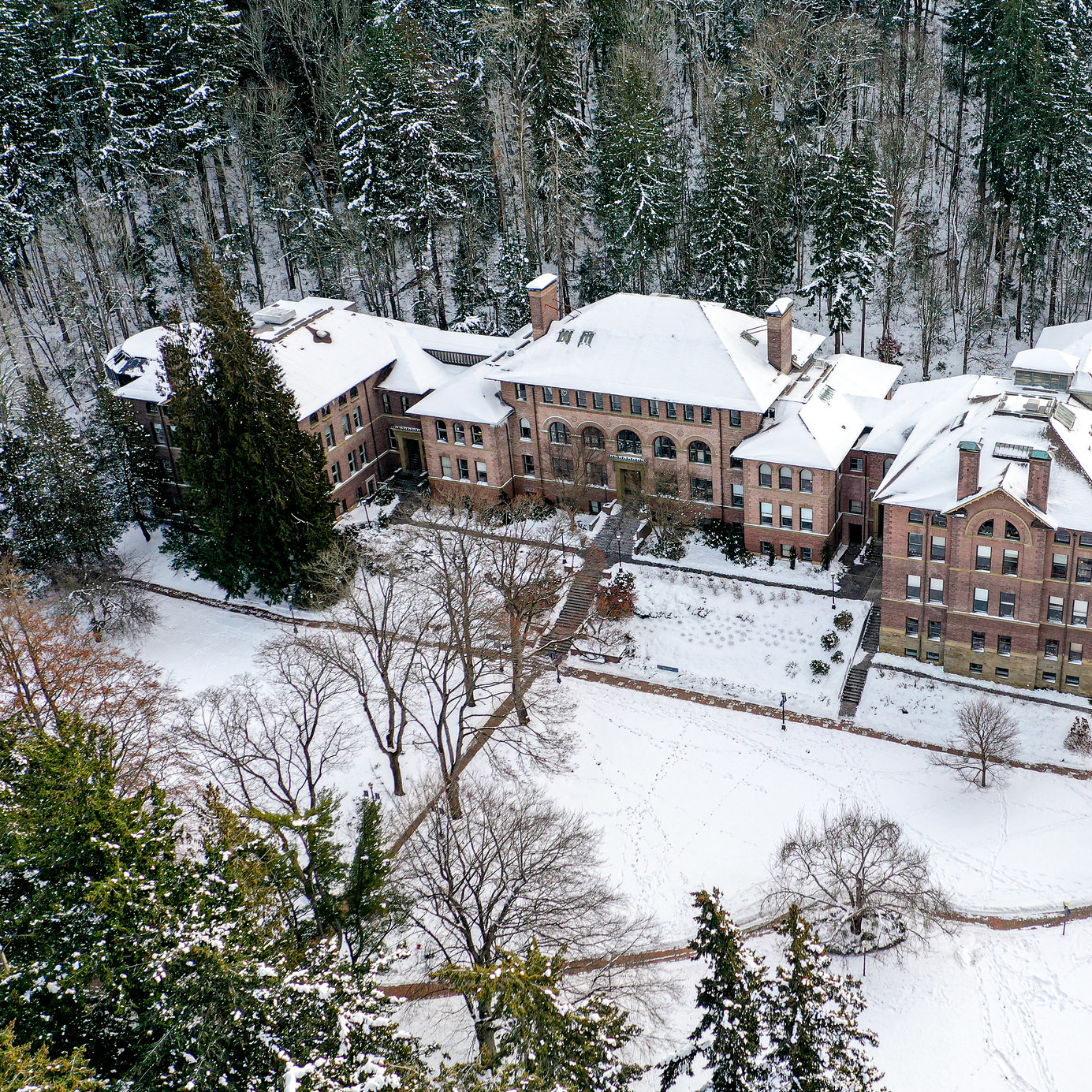 View of old main covered in snow from above
